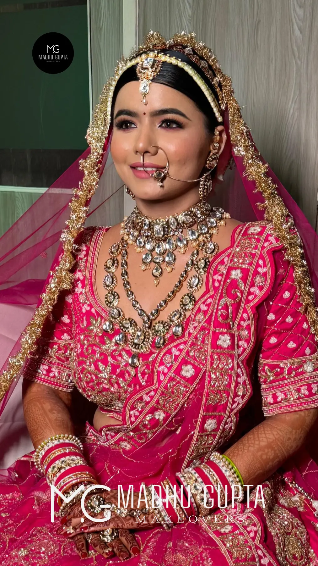 Simran, Rani Pink Lehenga. Bridal makeup by Madhu Gupta at MG Makeovers, Gurugram